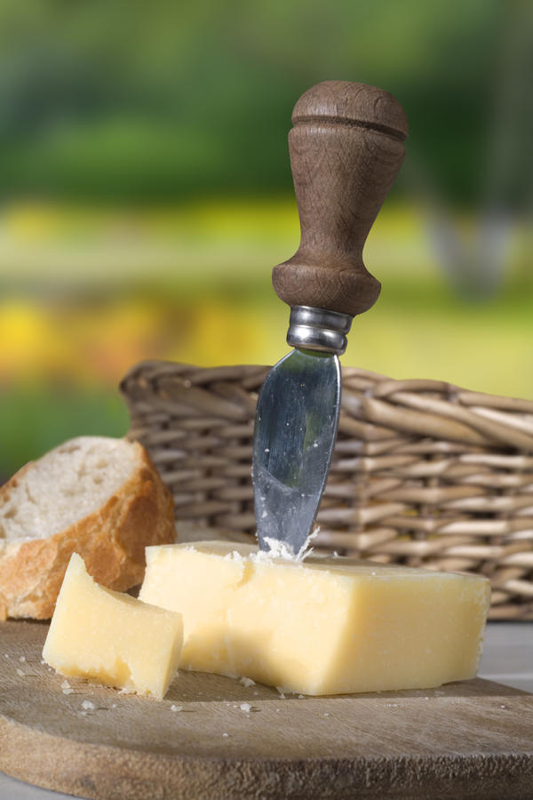 Italian cheese, parmigiano reggiano with special knife