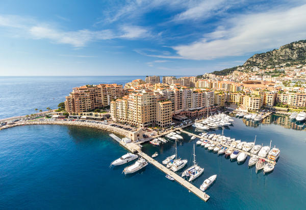 Luxury motor yachts docked in Fontvielle harbour, Monaco