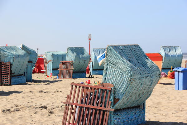 Roofed wicker beach chairs. Egmond aan Zee, North Sea, the Netherlands.