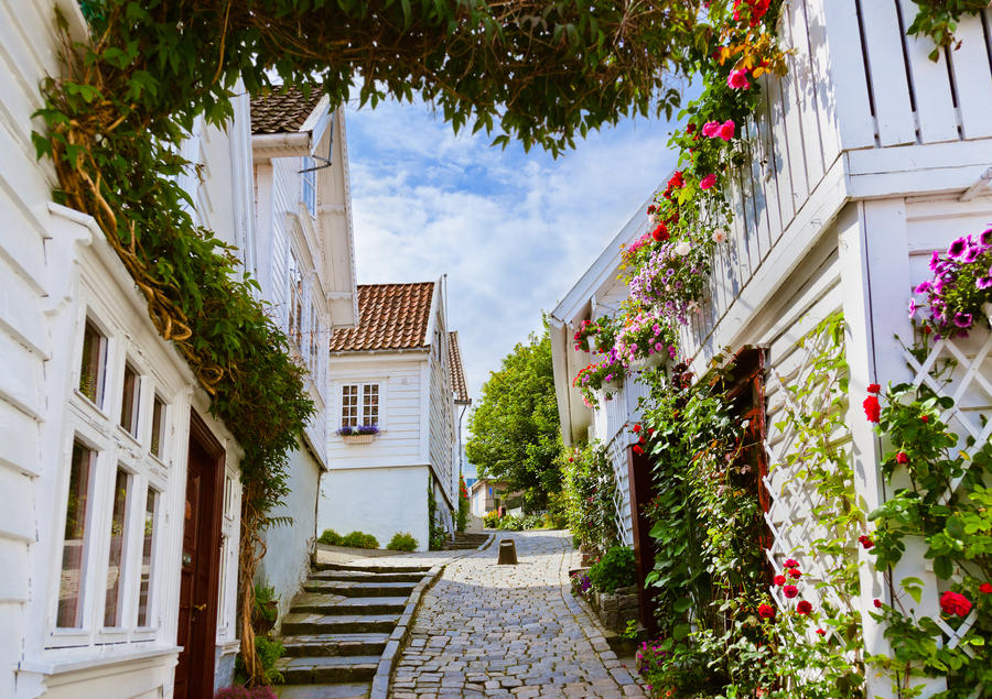 Street with white wooden houses in old centre of Stavanger - Norway - architecture background