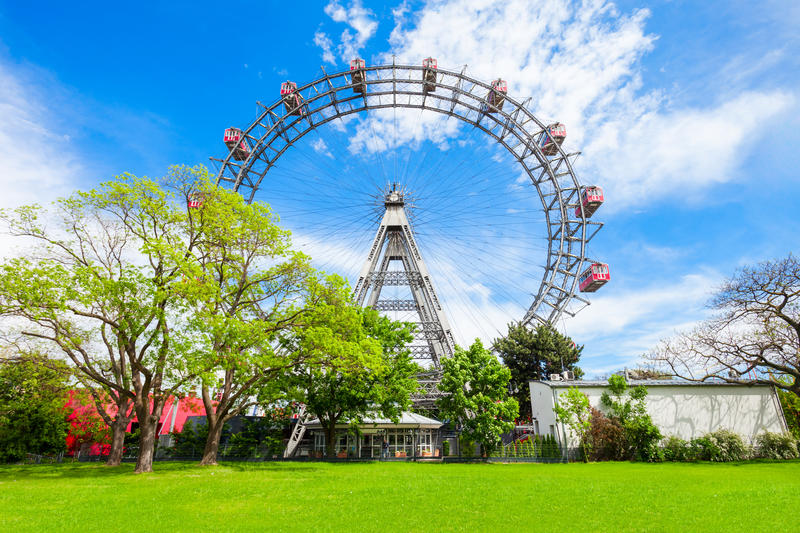 The Wiener Riesenrad or Vienna Giant Wheel 65m tall Ferris wheel in Prater park in Austria, Vienna. Wiener Riesenrad Prater is 
Vienna's most popular attractions.