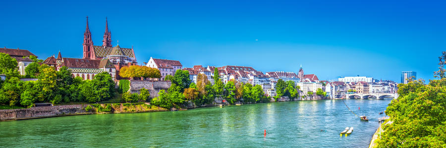 Old city center of Basel with Munster cathedral and the Rhine river, Switzerland, Europe. Basel is a city in northwestern Switzerland on the river Rhine and third-most-populous city.