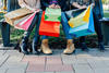 Closeup of girls with colorful shopping bags