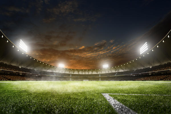 Empty night grand soccer arena in the lights