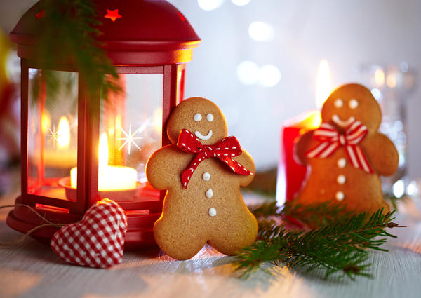 Christmas Decorations with Two Gingerbread men, lamp with candle and christmas baubles
